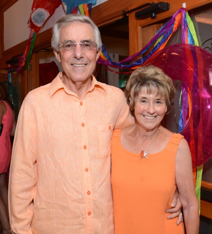 Larry Lanvette and Rehoboth Beach-Dewey Beach Chamber of Commerce CEO Carol Everhart arrive in complementary orange to support the museum.